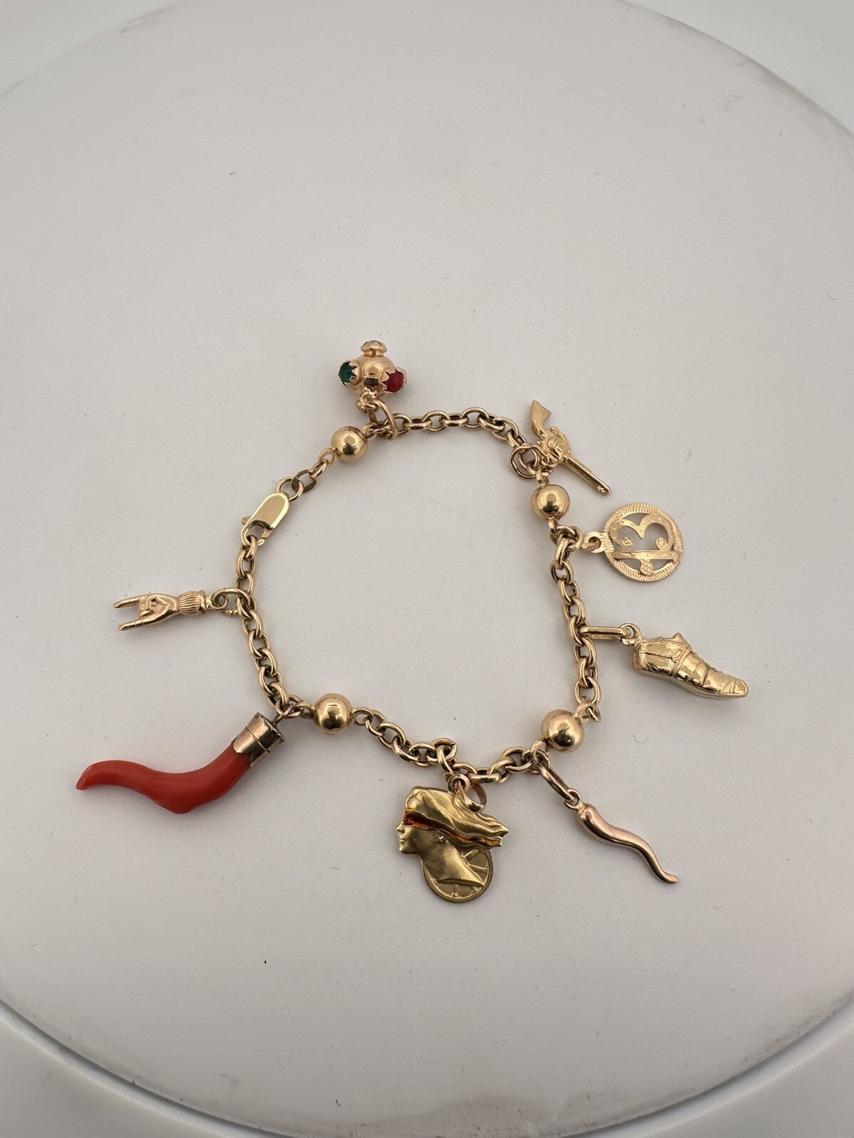 Bracciale portafortuna artigianale in oro 18 kt con 8 charms – foto 11