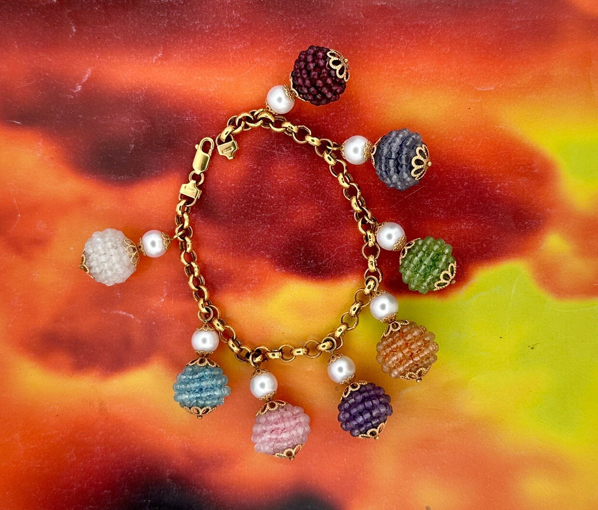 Bracciale charms in oro giallo 18 kt con pietre dure e perle – foto 8
