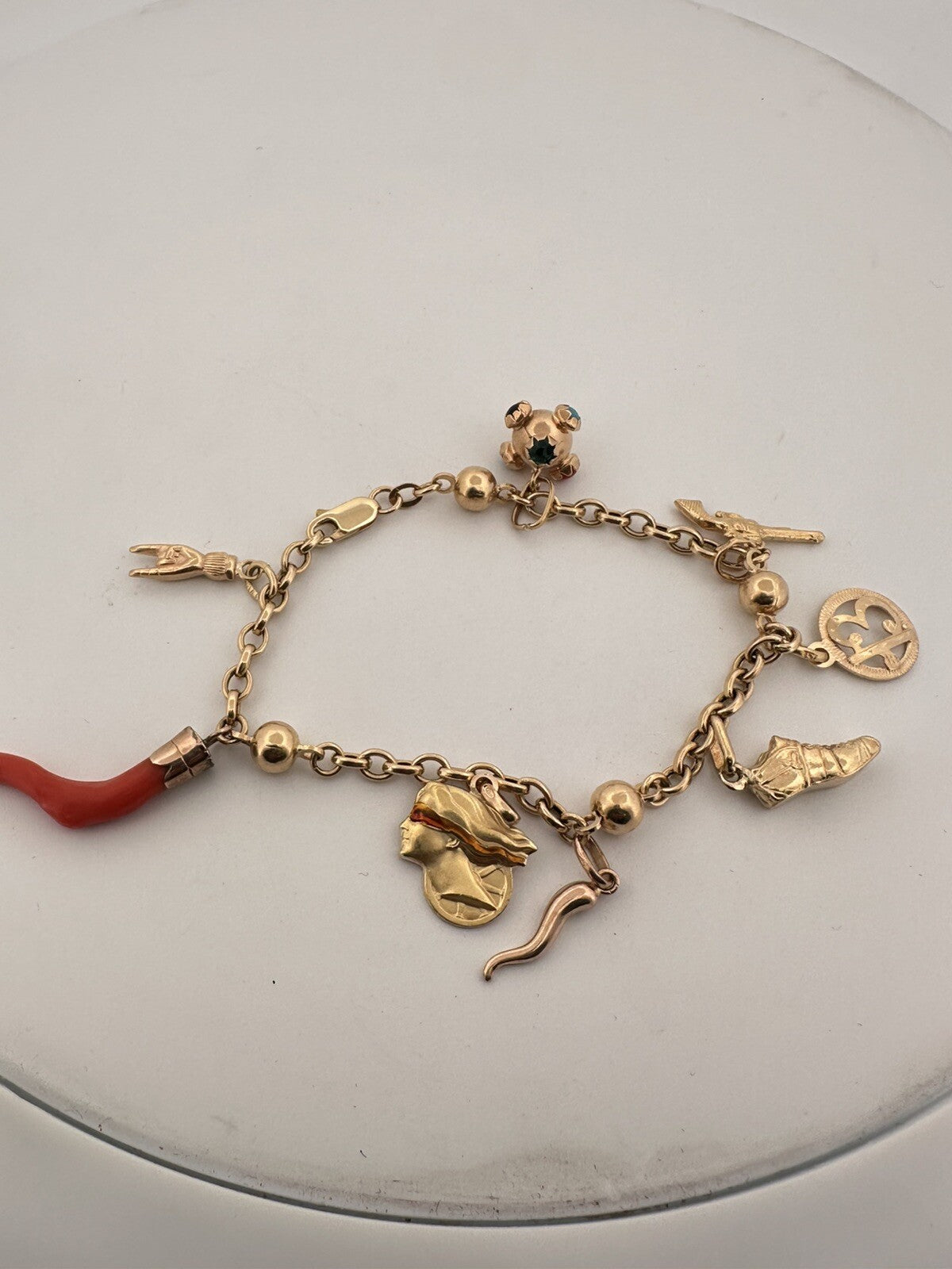 Bracciale portafortuna artigianale in oro 18 kt con 8 charms – foto 9