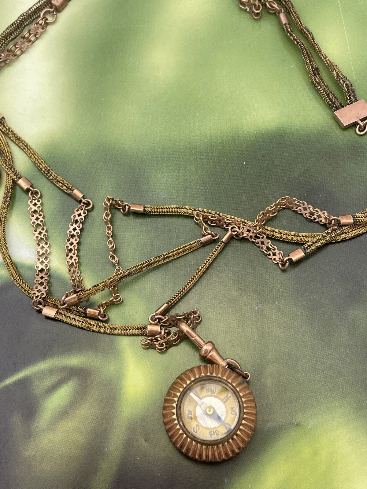 Doppia collana porta-orologio in oro rosa 6/7 kt con bussola e ciondoli – foto 9